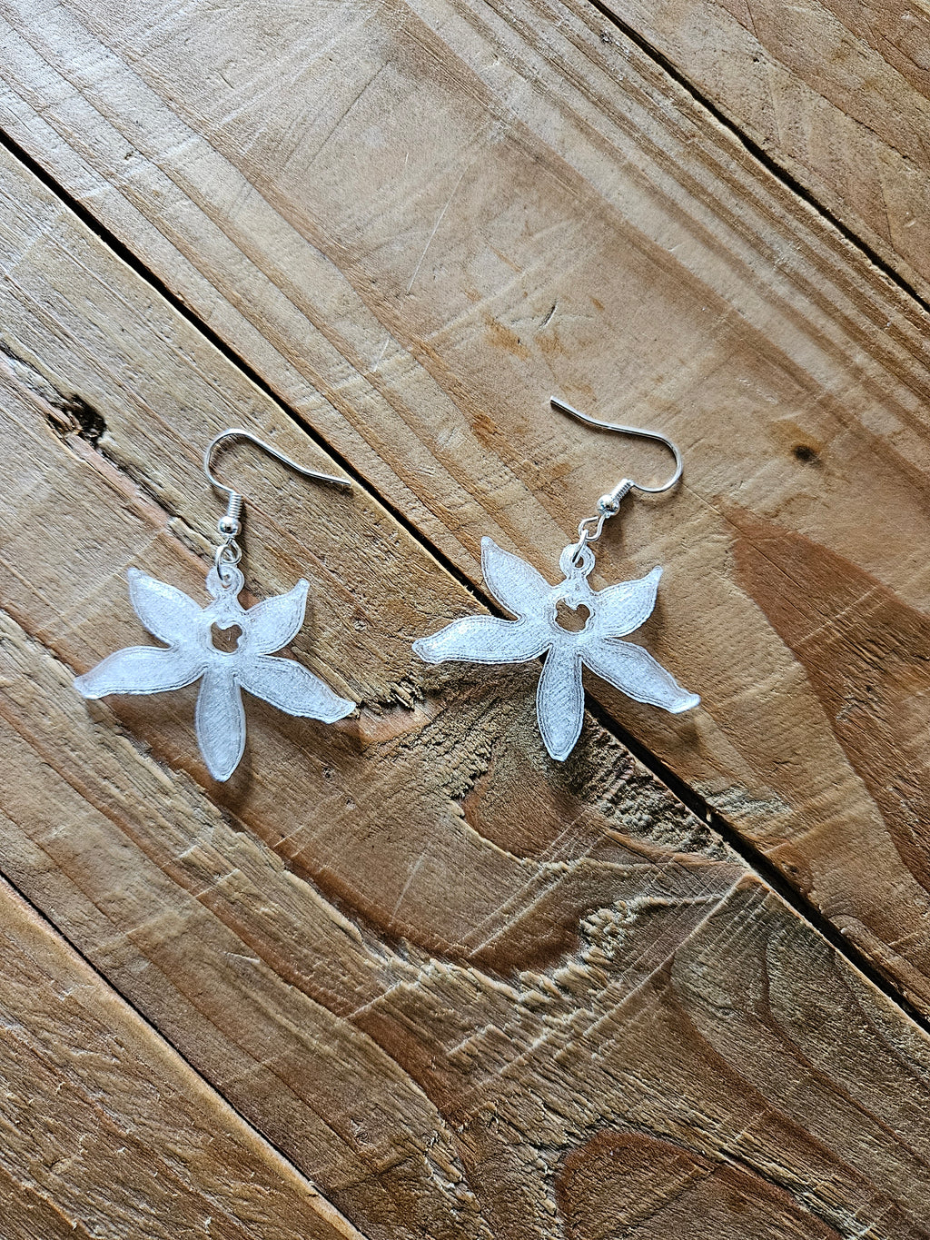 Boucle d'oreille feuille de vanille.